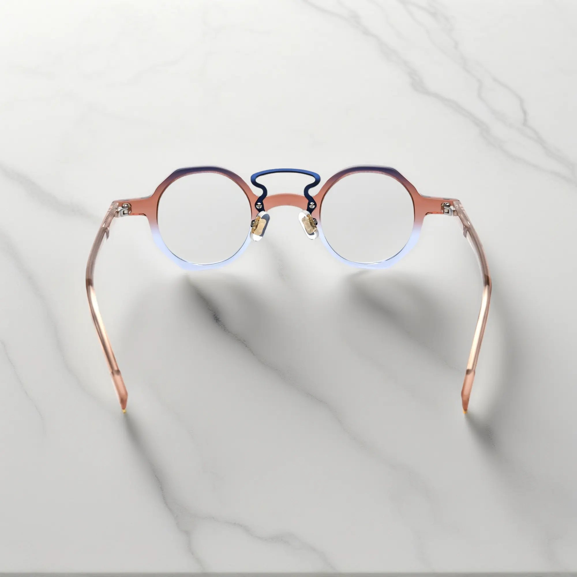 Angled view of VoyueLens™ VL19244 lightweight geometric eyeglasses featuring Mocha Blue Blend acetate frame